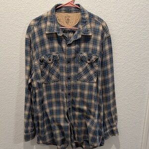 Red head men’s blue plaid shirt